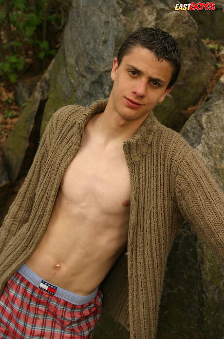 East Boys: Young dude Eliah get naked and showing tight ass outdoor