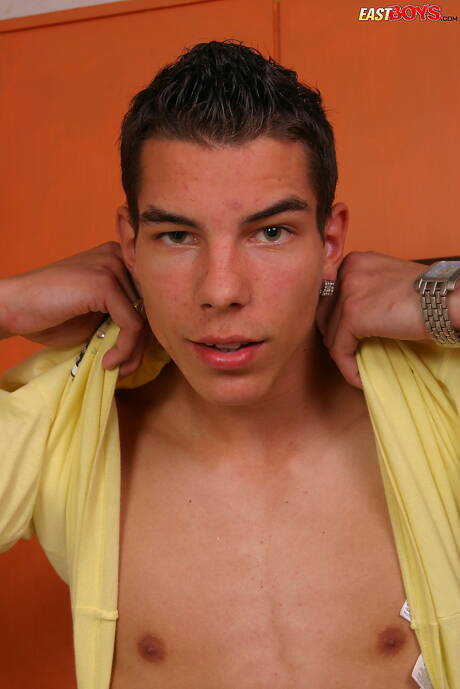 Young dude Donny shows a perfect body in kitchen