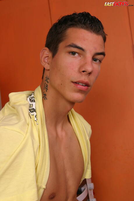 Young dude Donny shows a perfect body in kitchen