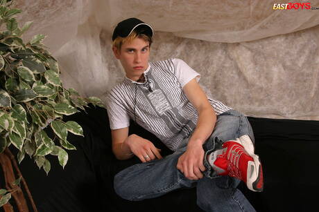 Young dude Dano undressing and showing his butt