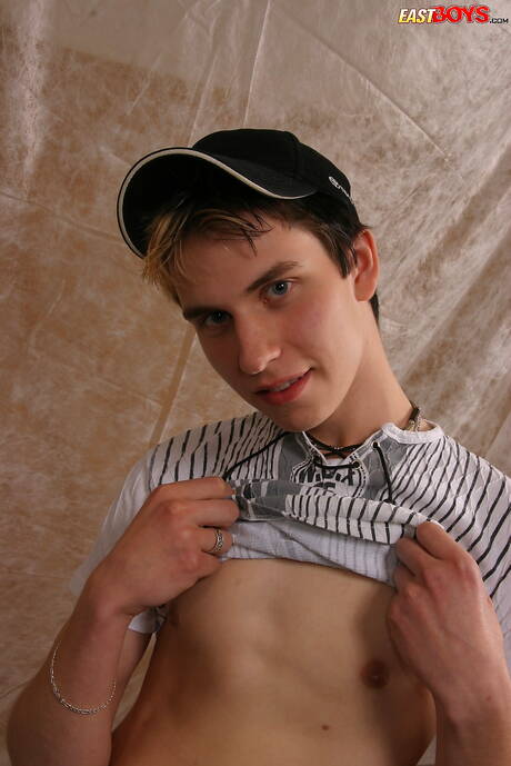 Young dude Dano undressing and showing his butt