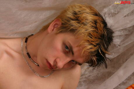 Young dude Dano undressing and showing his butt