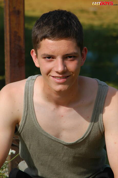 Beautiful boy Celio posing naked and showing hot butt outside